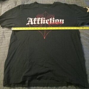 Two affliction t shirts